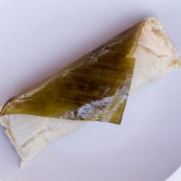 Tamal Pisque · Tamale stuffed with chipilin and black beans.
