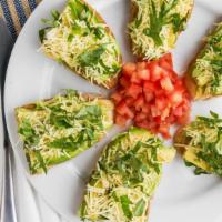 Avocado Toast · Vegetarian. Grilled ciabatta bread topped with fresh avocado, chopped roma tomato, Parmesan ...