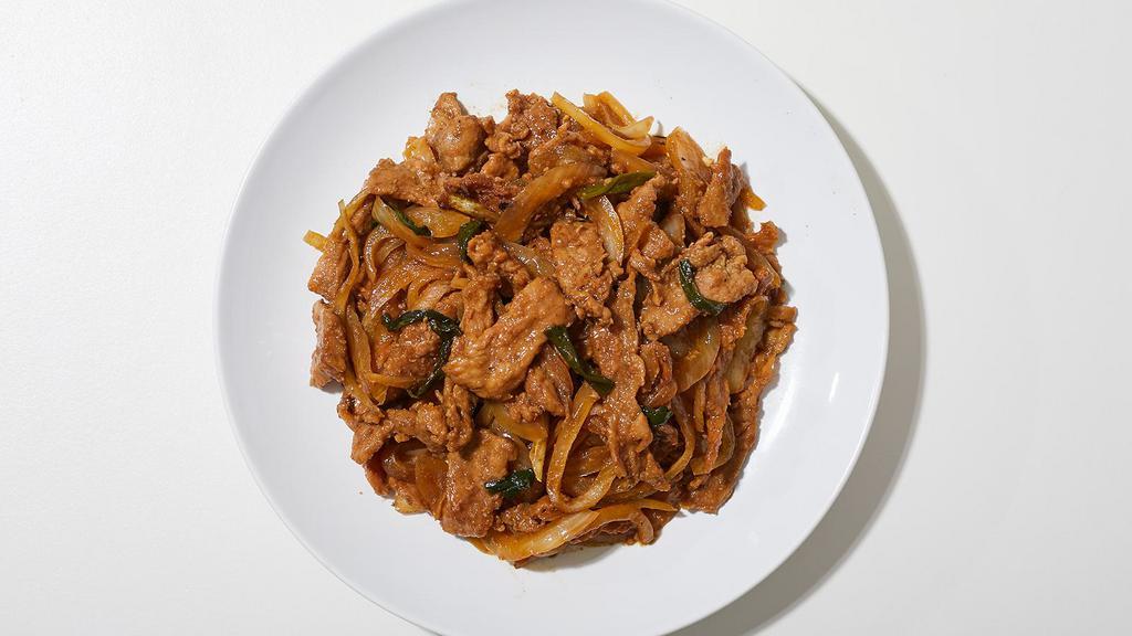 Mongolian Beef · Beef stir fried with onions, garlic, and scallions.