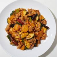 Kung Pao Chicken · Chicken stir fried in a spicy sichuan chili sauce with peanuts, scallions, and peppers.