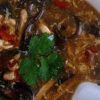 Hot And Sour Soup · Spicy and tangy broth.