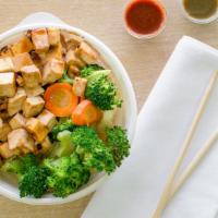 Tofu Bowl · 5 ounces of teriyaki flavored organic tofu served over your choice of brown or white rice an...