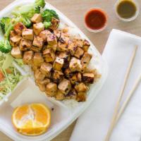 Tofu Plate · 7 ounces of teriyaki flavored organic tofu served over your choice of brown or white rice an...