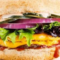 Double Cheeseburger · two signature burger patties, plant-based cheddar, pickles, red onions, mixed lettuce, thous...