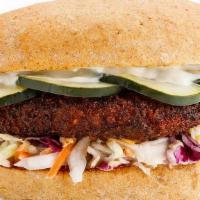 The Real Nashville Hot  · spicy fried plant-based chicken in Nashville hot sauce, Southern slaw, pickle chips, plant-b...
