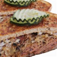 Reuben Sandwich · corned beef-style seitan, sauerkraut, plant-based cashew horseradish cheese, pickle chips, t...