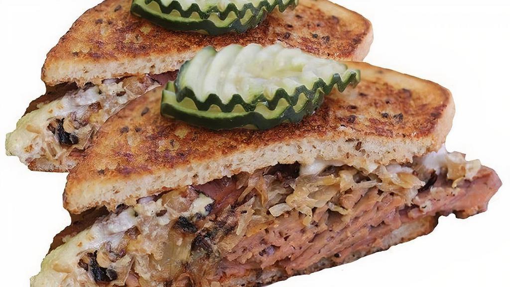 Reuben Sandwich · corned beef-style seitan, sauerkraut, plant-based cashew horseradish cheese, pickle chips, thousand island dressing, rye bread