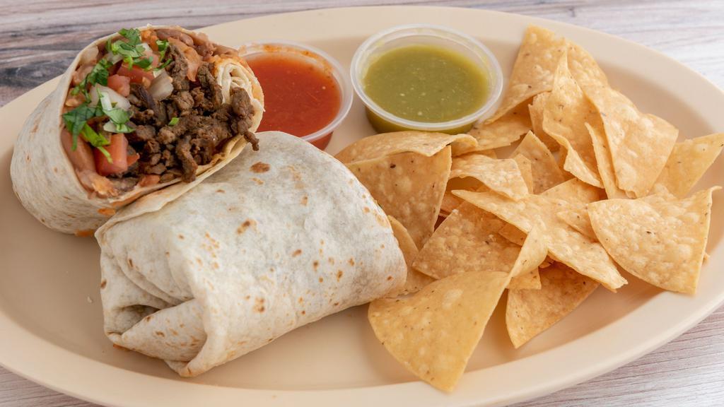 Burrito Box · With your choice of of meat, (steak, chicken, carnitas, al pastor) cheese,  rice, beans in a flour tortilla), chips, salsa and guacamole.