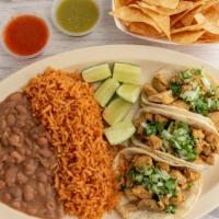 Tacos Box · 3 corn tortillas tacos with your choice of meat, (steak, chicken, carnitas, al pastor) toppi...