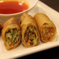 Vegetarian Eggrolls · Crispy eggrolls with cabbage and carrot filling, served with sweet & sour sauce (4)