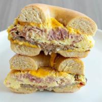 The Brooklyn · Eggs, Bacon, Sausage, Ham & American Cheese (With Your Choice Of Bagel)