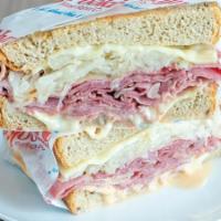 Hot Corned Beef Reuben · Boar's Head Corned Beef, Sauerkraut, Swiss Cheese & 1000 Island (With Choice Of Bagel Or Bre...