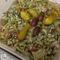 Greek Salad · Lettuce, tomato, onion, parsley, feta cheese, and house dressing.