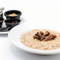 Steel Cut Oatmeal · Served with Candied Pecans, Raisins and Brown Sugar