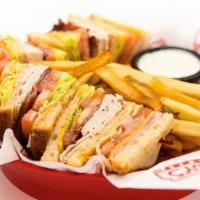 Clubhouse Sandwich · Ham, Turkey, Smoked Bacon, Lettuce, Tomato, Cheddar Cheese, 1000 Island on Toasted Sourdough