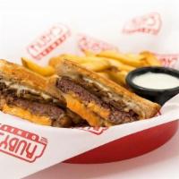 Patty Melt · Premium Angus Burger, Swiss Cheese, Caramelized Onions, 1000 Island Dressing on Grilled Rye ...