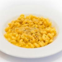 Grown-Up Mac & Cheese · Corkscrew Pasta with a Four Cheese Blend, Topped with Toasted Bread Crumbs and Parsley
