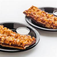 Double Pizza Sticks · 4 oven-fresh breadsticks topped with chicken, your choice of sauce and mozzarella cheese. Ba...