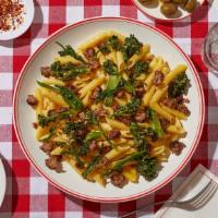 Penne With Sausage And Broccoli Rabe · Penne pasta tossed with italian sausage and broccoli rabe.