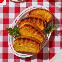 Garlic Bread (8Pc) · Buttery grilled bread baked with minced garlic with a side of marinara.