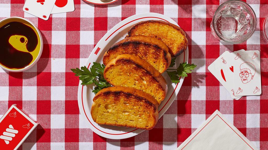 Garlic Bread · Buttery grilled bread baked with minced garlic.