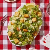 Caesar Salad · Crisp romaine lettuce with croutons, and parmesan cheese with a creamy caeser dressing.