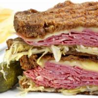 Pastrami & Swiss Grilled Cheese · Fresh mild Swiss cheese melted topped with lean pastrami beef between two slices of fresh br...