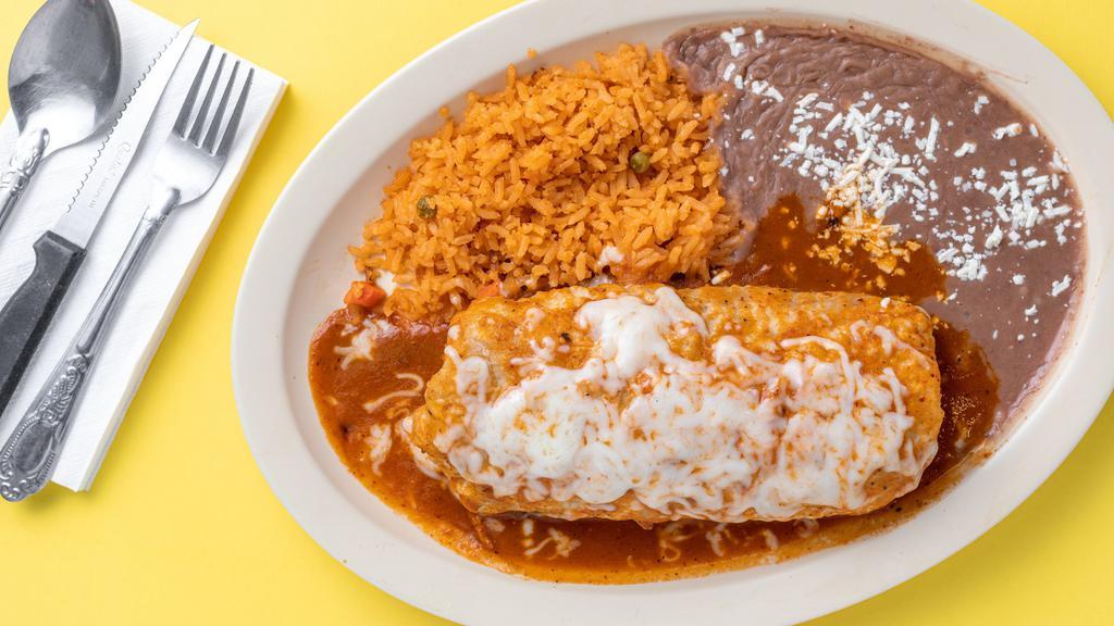 Burrito Mojado Combo · Wet burrito is smothered with your choice of red or green salsa and mozzarella cheese.