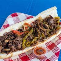 Traditional Philly Cheesesteak · Crafted with premium steak, grilled onions, American cheese, mushrooms, bell peppers, provol...