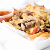 Philly Cheesesteak Fries · Crispy seasoned fries covered with sliced steak, melted provolone cheese, Grilled onion, mus...