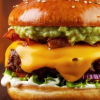 Bacon Avocado Burger · 1/2 lb of juicy beef grilled to perfection, served with sizzling bacon, creamy avocado, chee...