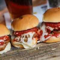 Meatball Sliders · Sliced meatballs topped with a healthy portion of our house marinara and melted mozzarella c...