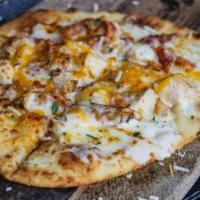 The Slim Shady · Our house made ranch sauce topped with topped with diced grilled chicken bacon cheddar and m...