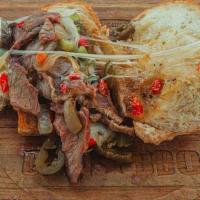 Jake Palet'S Cheese Steak · Smoked Tri-tip w/ provolone, grilled onions & peppers on an amoroso roll.