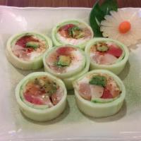 Fantastic 4 Roll · 4 different kinds of fish, spicy tuna & imitation crab wrapped w/ cucumber & topped w/ garli...