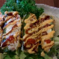 Kaboom Roll · Jalapeno topped w/ cream cheese, imitation crab & spicy tuna, then deep-filled & topped w/ s...