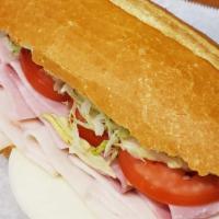 Ham, Turkey And Cheese Cold Sandwich · Lettuce, tomato, mayonnaise and mustard.