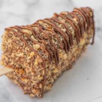 Cookies & Cream · Cheesecake dipped in choice of white or milk chocolate, covered in Oreo crumbs.