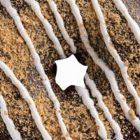 S'Mores · Chocolate icing, graham cracker crumbs, marshmallow drizzle