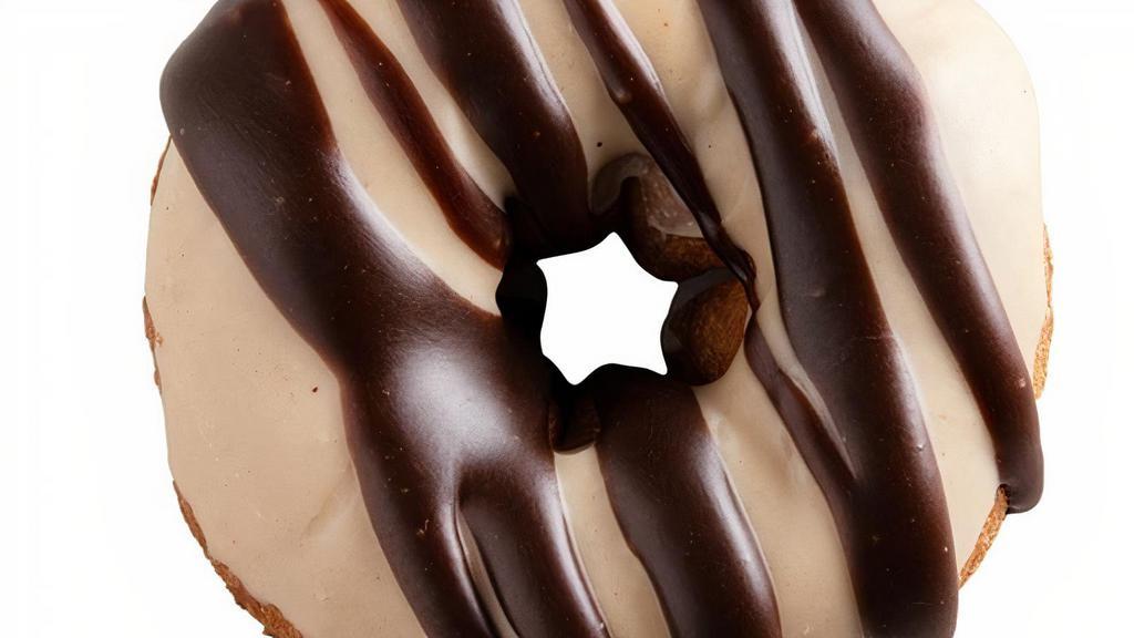 Peanut Butter In Paradise · Peanut butter icing with chocolate drizzle