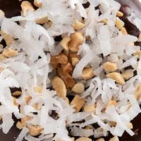 Coconut Island Bliss · Chocolate icing with chopped peanuts & shredded coconut