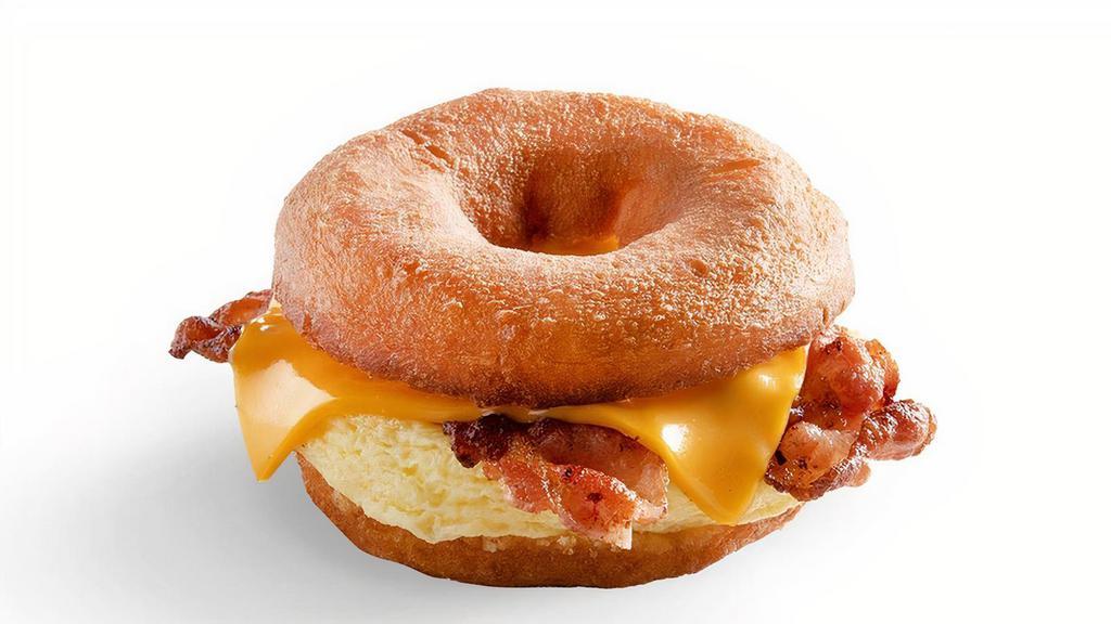 Bacon, Egg, And Cheese · Get your favorite breakfast combinations on a donut! This quacktacular breakfast sandwich includes bacon, egg, and cheese.