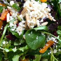 The Harvest Salad · Served with goat cheese, almonds, dried cranberries, apricots, tomato, and creamy balsamic v...