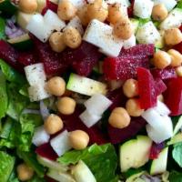 V Chopped · Served with roasted beets, jicama, grilled zucchini, garbanzo beans, roasted corn, tomato, r...
