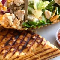Southwest Chipotle Wrap · Black beans, grilled corn, red onion, romaine, cheddar cheese, chipotle dressing, wrapped in...