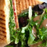 Grilled Vegetable Sandwich · Zucchini, eggplant, red pepper, and onion with melted provolone, sun-dried tomato pesto, bas...