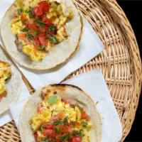 Large Breakfast Taco · Corn tortillas , scrambled egg, bacon, pico De gallo with your choice of salsa.