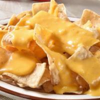 Cheese Nachos · Tortillas chips and nachos cheese.
