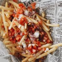 Greek Fries · Topped with feta cheese, red onion & tomato.