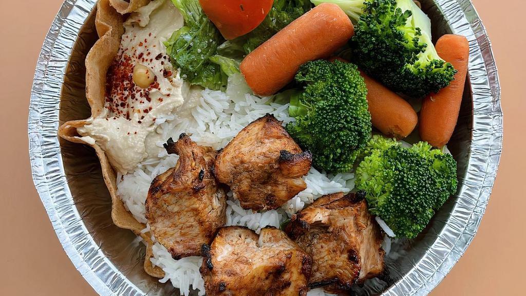 Bowls · Rice & steamed vegetables topped with your choice of meat.